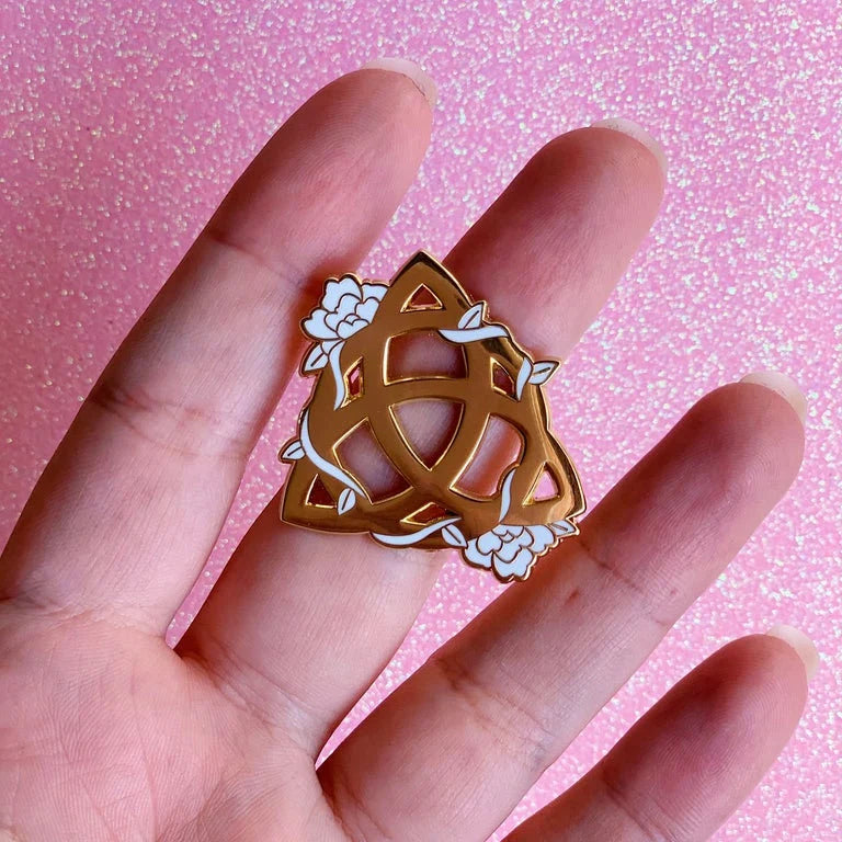 Charmed sign pins